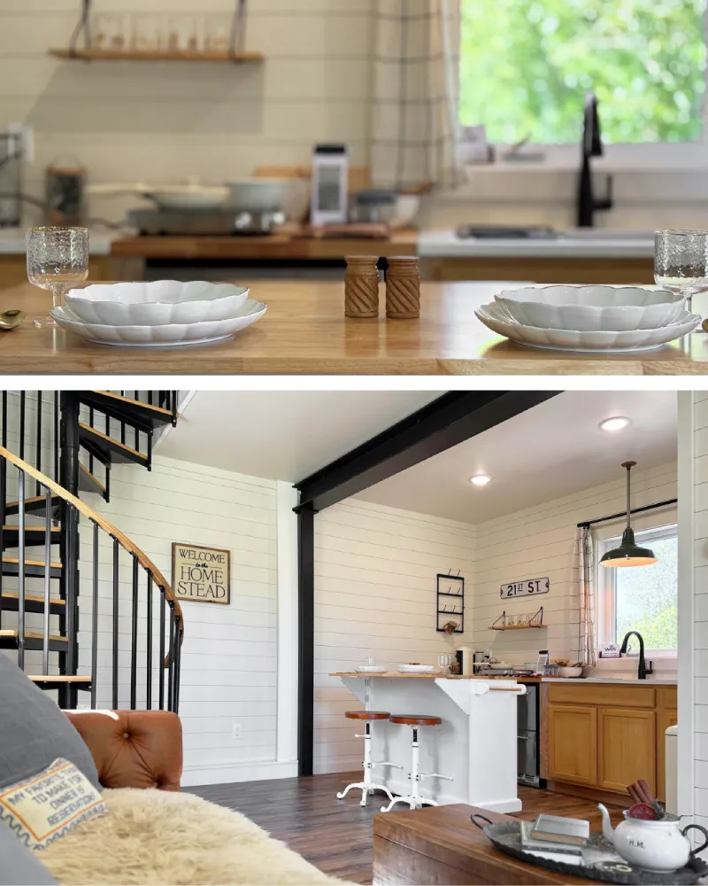 Kitchen and dining area inside The Nelson featuring a butcher block island, place settings, bar stools, and bright white shiplap walls.